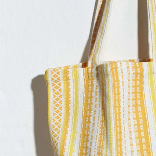 bolsa tela alpujarra amarilla blanca. Real Fábrica.