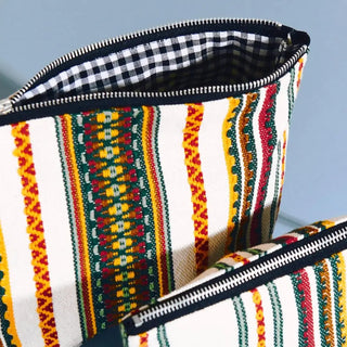 Estuche y neceser elaborados a mano por Eturel con tela manchega. Real Fábrica. 