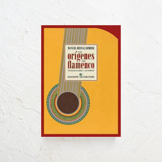 Libro que trata sobre los orígenes del flamenco en cuya portada aparece una ilustración de una guitarra española. Real Fábrica
