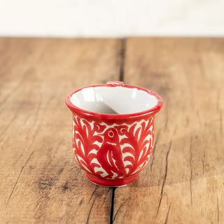 Frontal de la taza de café solo de cerámica de Granada rojo repintado pájaro. Real Fábrica
