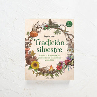 Libro sobre los ciclos de la naturaleza cuya portada muestra una corona otoñal. Real Fábrica