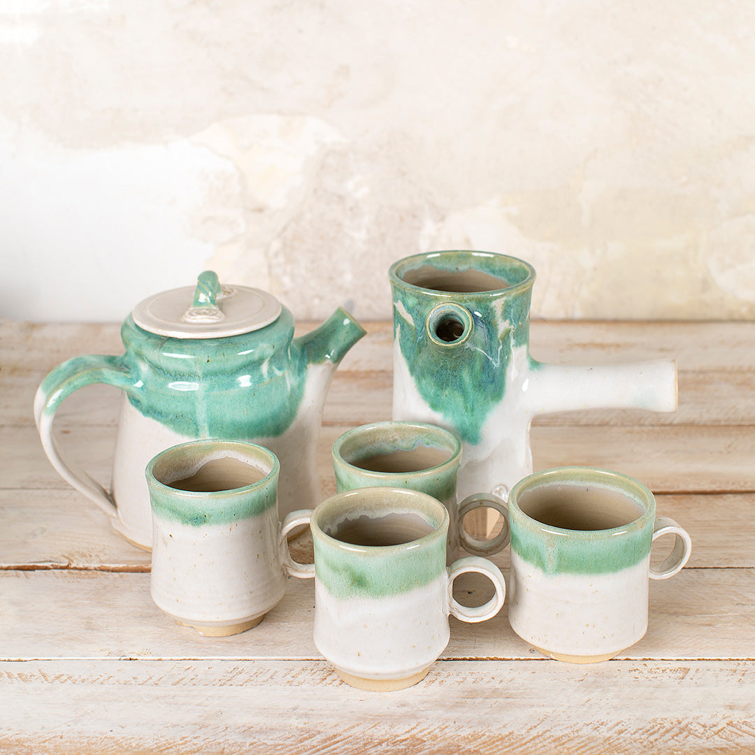 Juego de tetera y 4 tazas de cerámica artesanal en verde y azul. - valle  verde